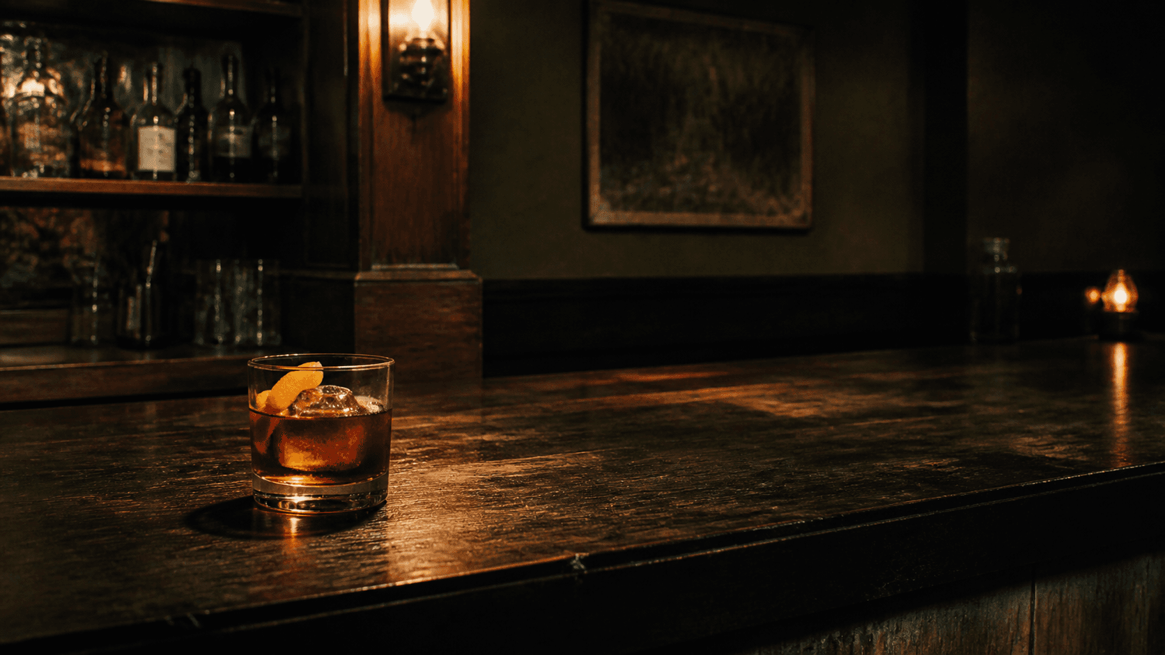 A dark spirit-forward cocktail at an intimate bar